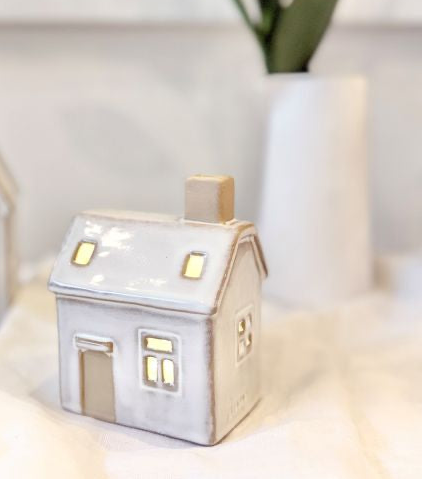 Lucia Snow House with lights